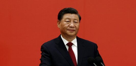 XI